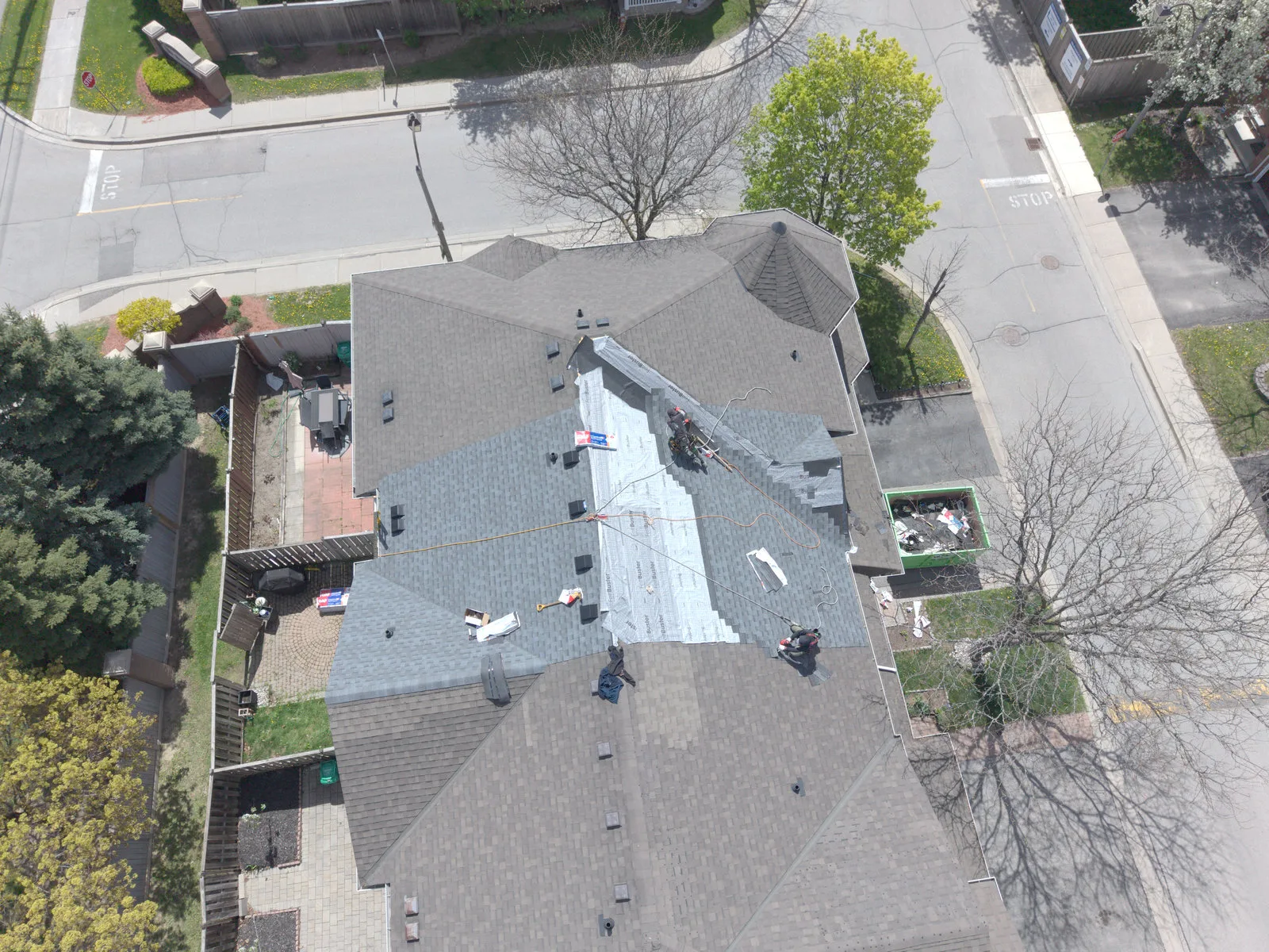 Roof replacement progress on a Brampton home, aerial view